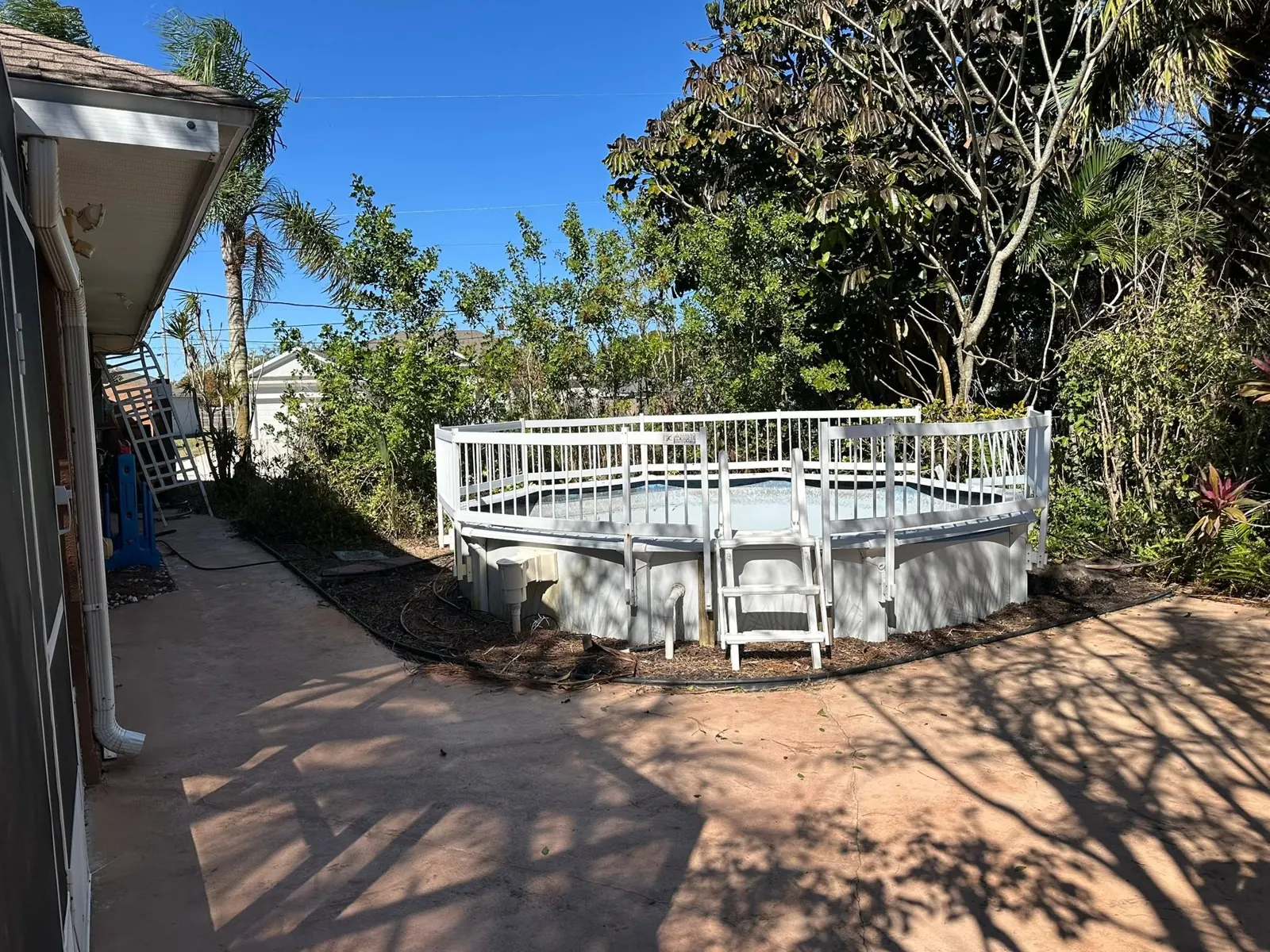 Above-ground pool structure before removal