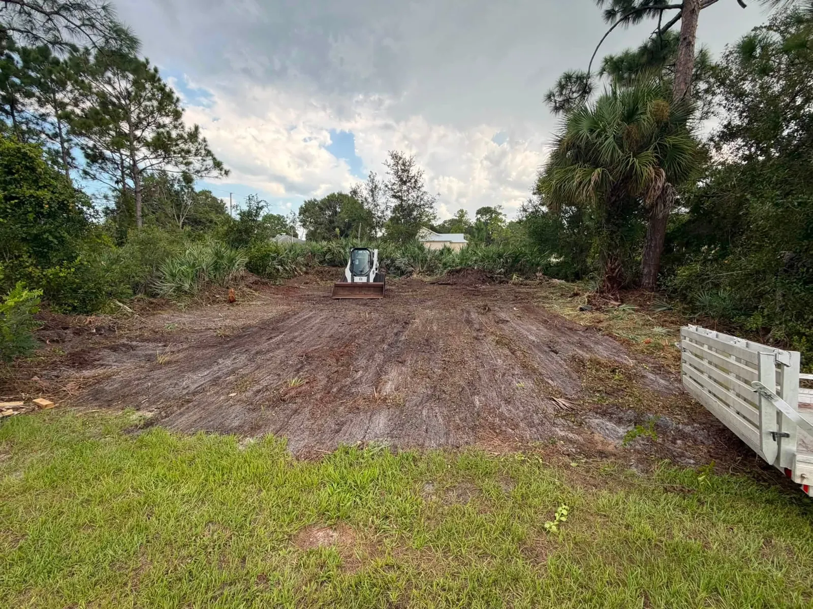 Cleared residential work area after skid-steer work